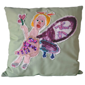 Embroidered pillow by Nina Aronson