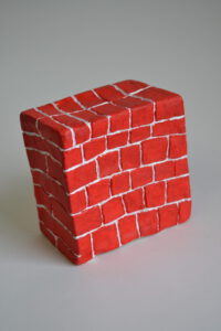 Brick wall sculpture by Carl Phillips