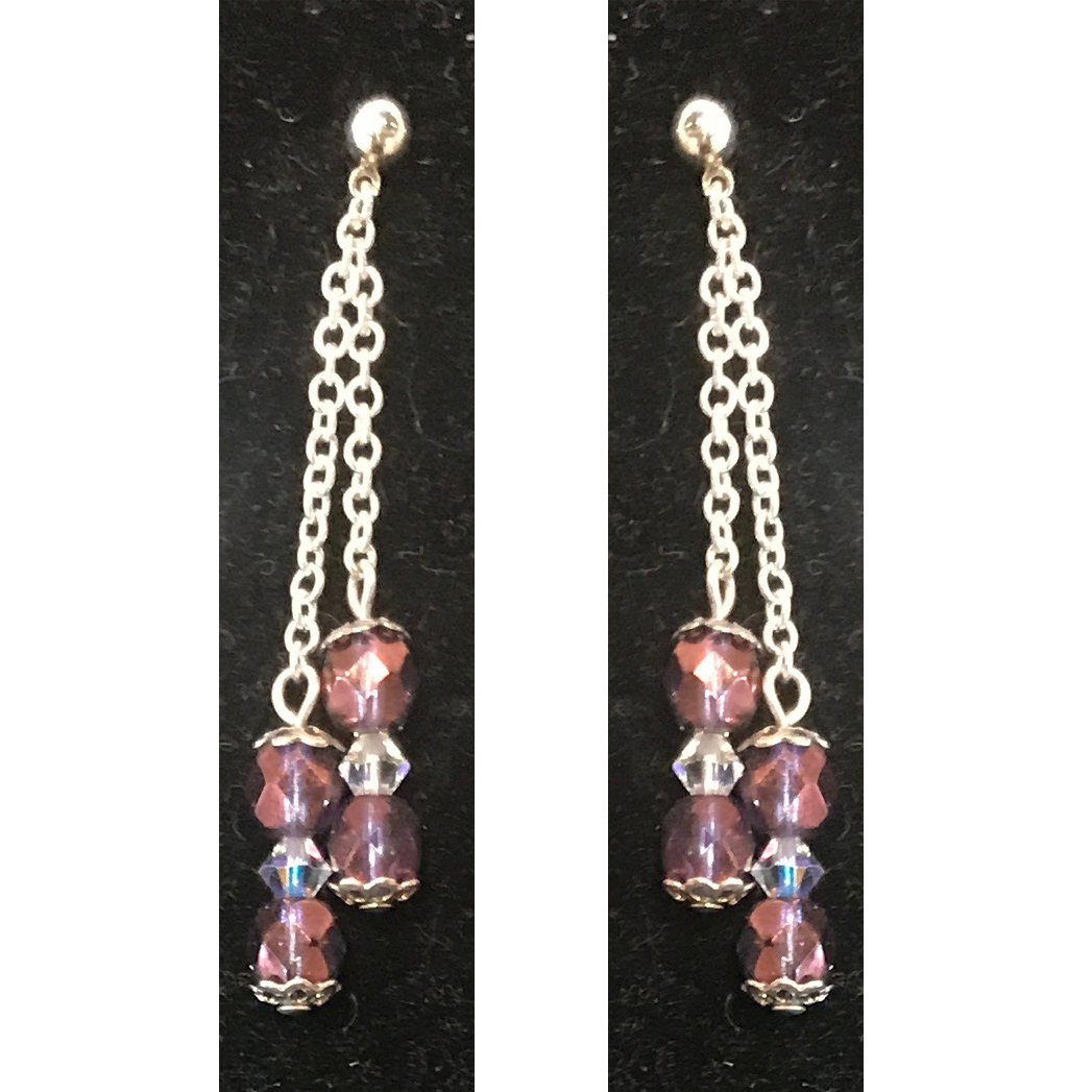 Earrings with mauve beads by Judy Phillips