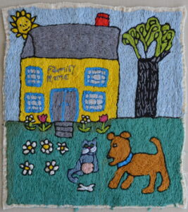 Family Home embroidery by Mary DeCesar