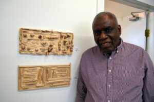 Sidney Perry with his work in Gateway Makers