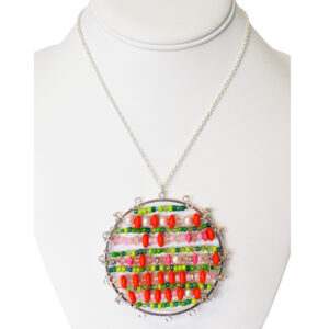 Disc pendant necklace by Janet Inman