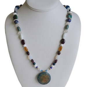 Blue, garnet and teal necklace by Barbara Brown