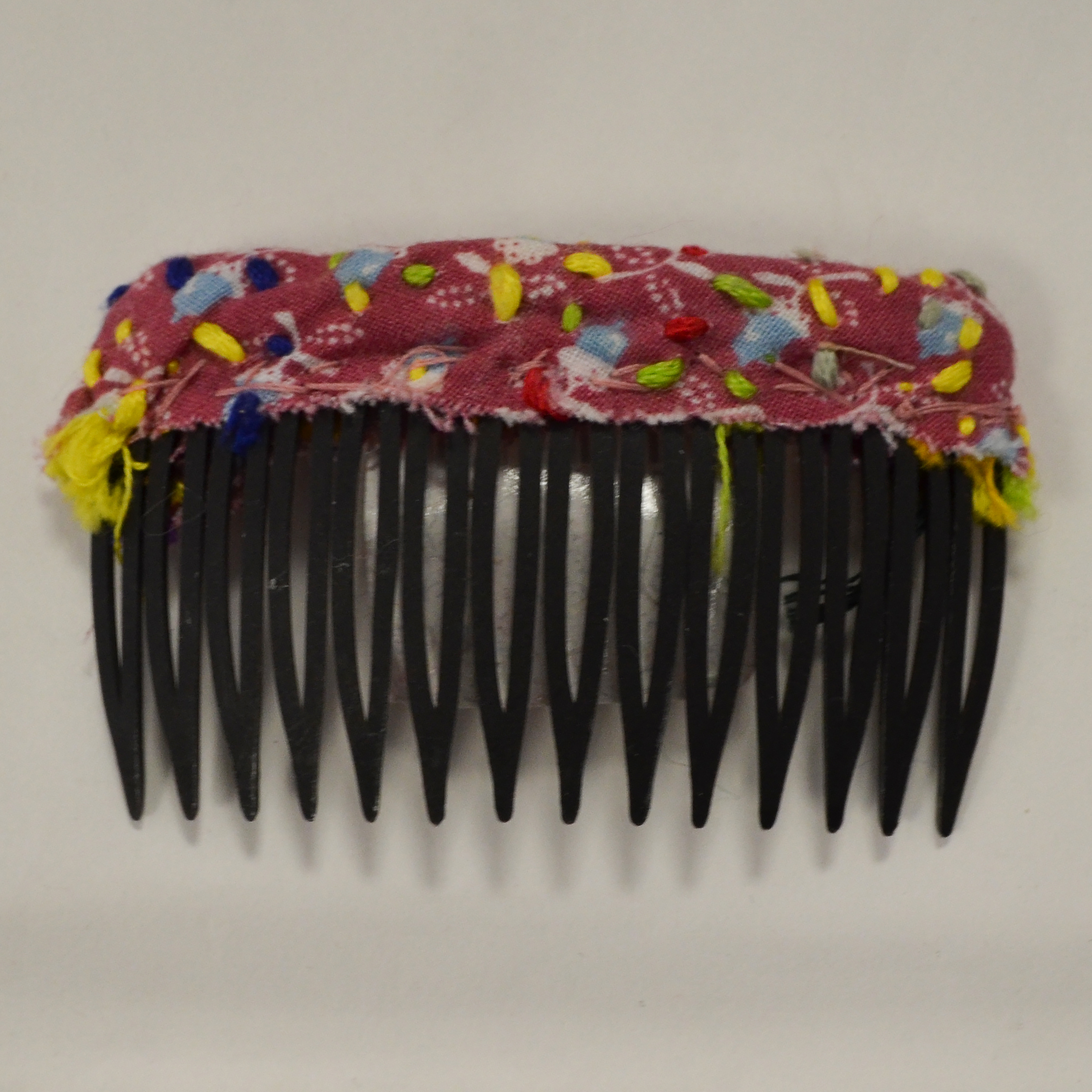 black and pink hair comb by Amy Caliri