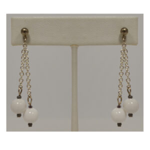 White post dangle earrings by Judy Phillips