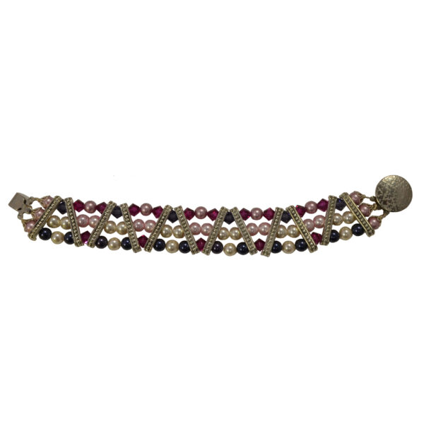 Pink and purple bracelet by Judy Phillips