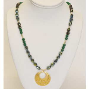 Gold and green pendant necklace by Patrick Shea
