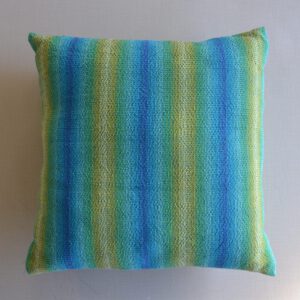 Blue and green woven pillow by Ona Stewart