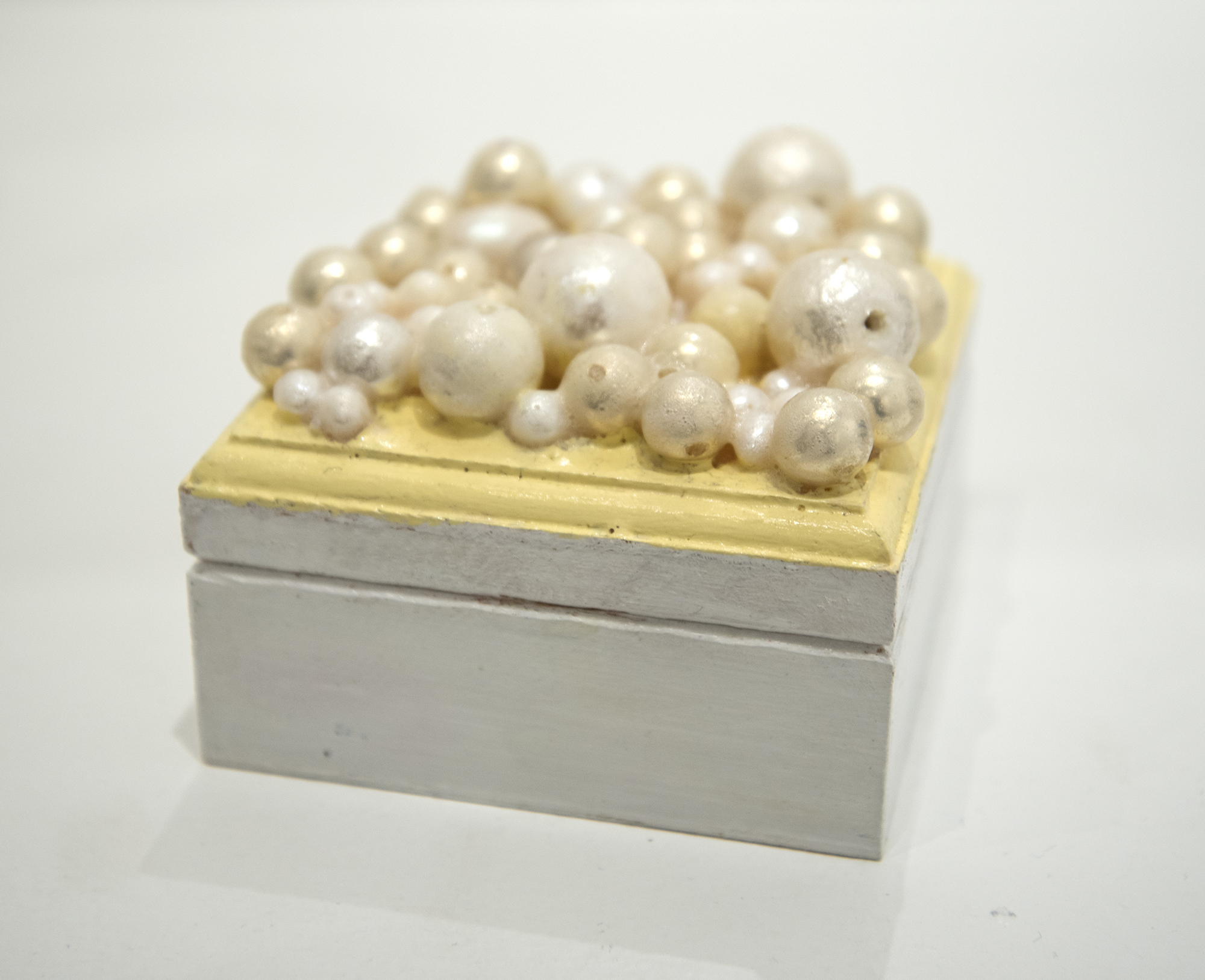 Chandra Phillips. Untitled. Pearls and paint on wooden box. 2019.